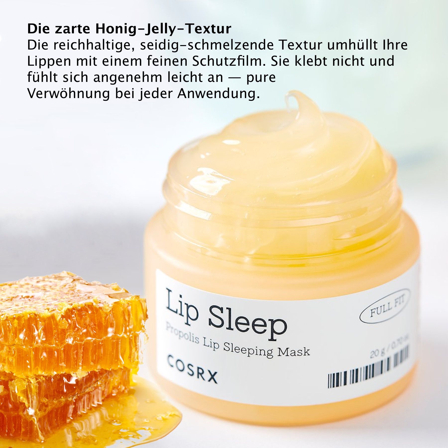 Vasetto di COSRX Lip Sleep Propolis Sleeping Mask. Crema gialla. Favo. Testo con nome e marchio.