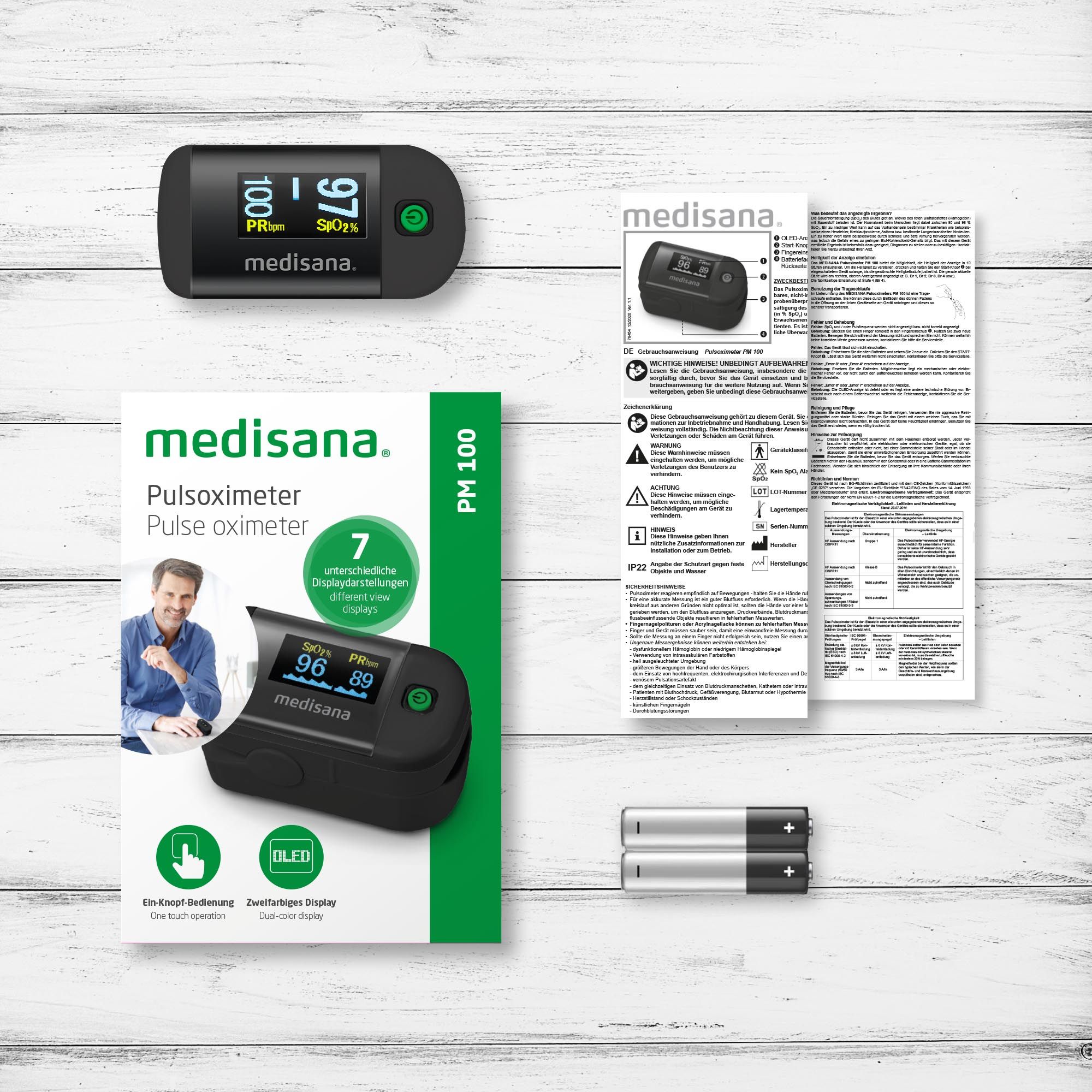 Pulsossimetro medisana PM 100, confezione, manuale e batterie.