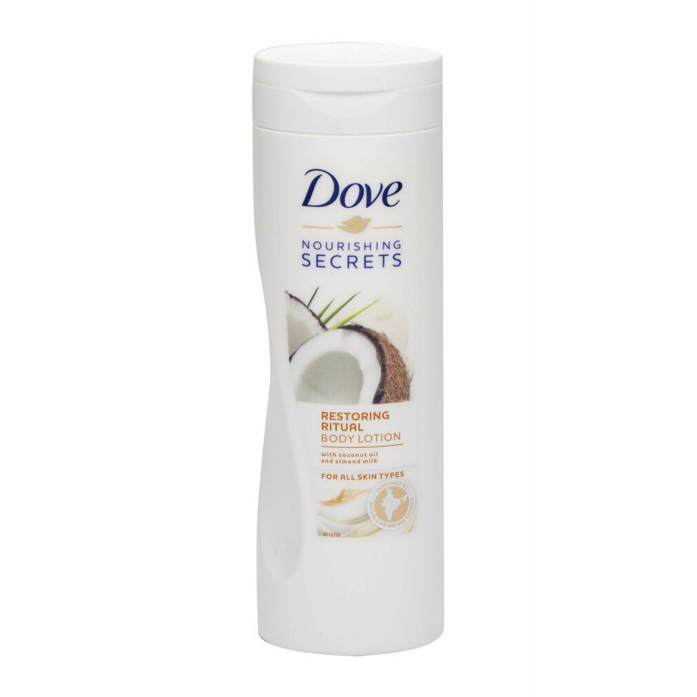 Flacone Dove bianco con illustrazione di cocco. Testo: Nourishing Secrets, Restoring Ritual Body Lotion. Per tutti i tipi di pelle. Con olio di cocco.