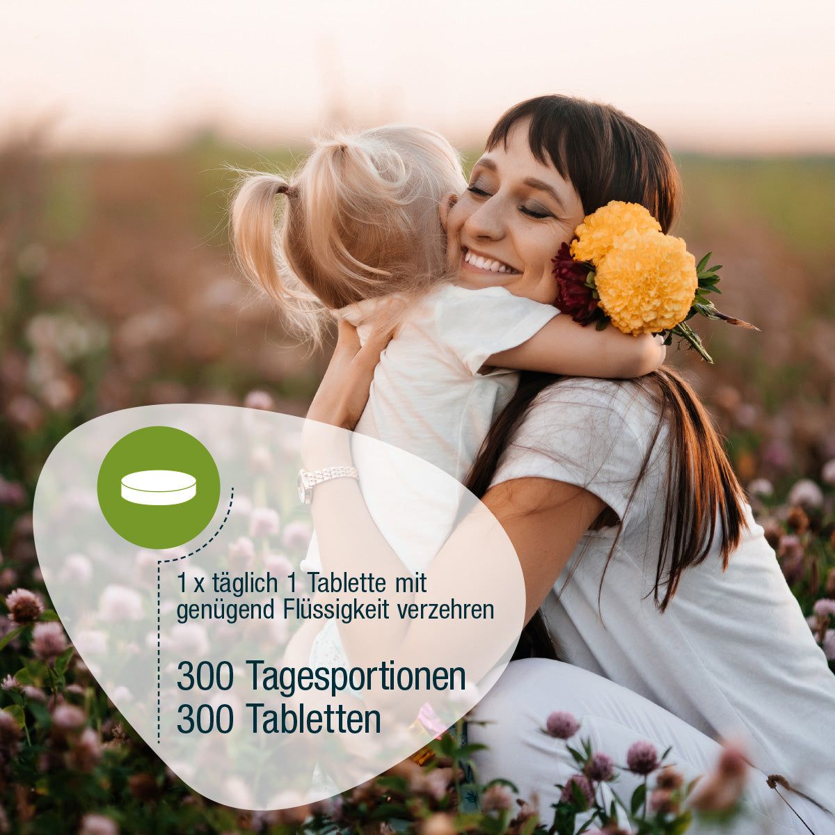 Donna abbraccia bambino, tiene fiori. Testo: 1 compressa al giorno con liquido. 300 porzioni.