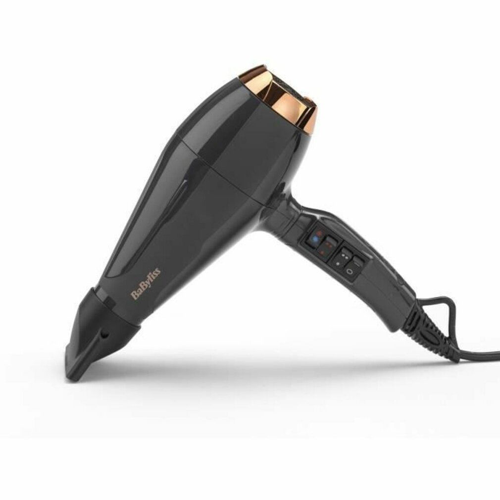 Asciugacapelli nero. Marca BaByliss. Dettagli dorati. Comandi sull'impugnatura.