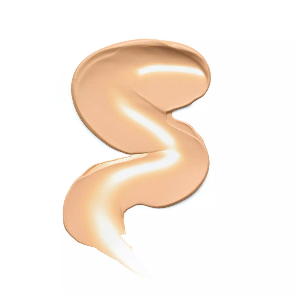 Campione di primer chiaro e color crema su sfondo bianco. La consistenza è liscia e leggermente curva.