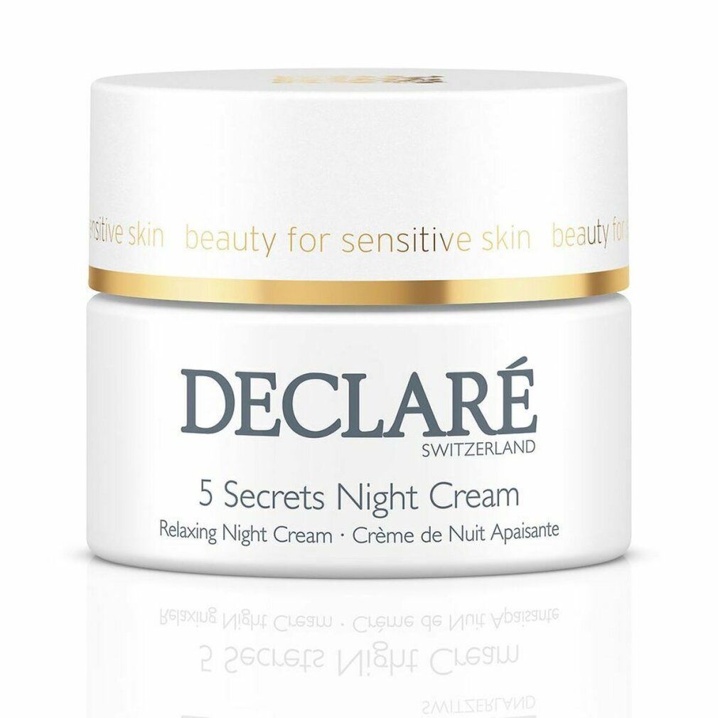 Vasetto bianco con bordo dorato. Scritta: DECLARÉ, 5 Secrets Night Cream, Relaxing Night Cream, Crème de Nuit Apaisante.
