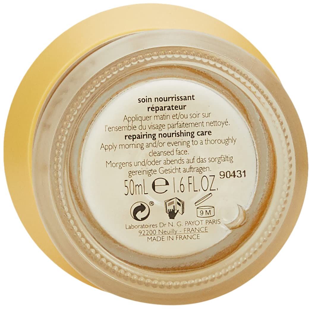Fondo del vaso di crema con testo. Contiene informazioni sull'uso e sugli ingredienti.