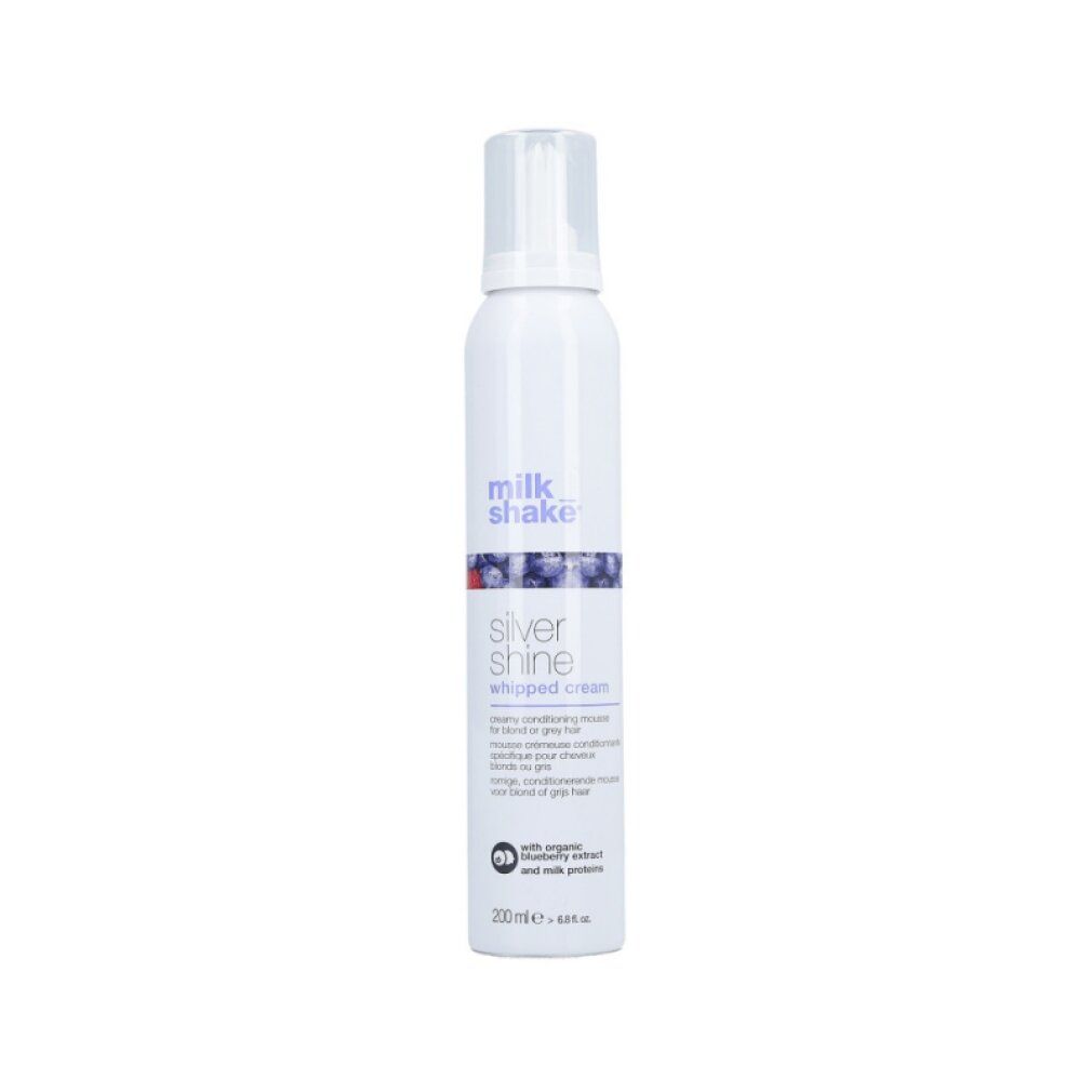 Spray bianco con erogatore. Testo: milk_shake, Silver Shine, whipped cream. Accenti blu e viola. 200ml.