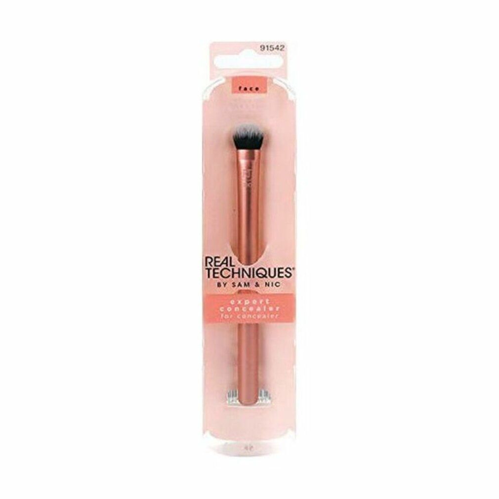 Confezione con un pennello. Sulla confezione sono scritti "REAL TECHNIQUES" e "EXPERT CONCEALER".