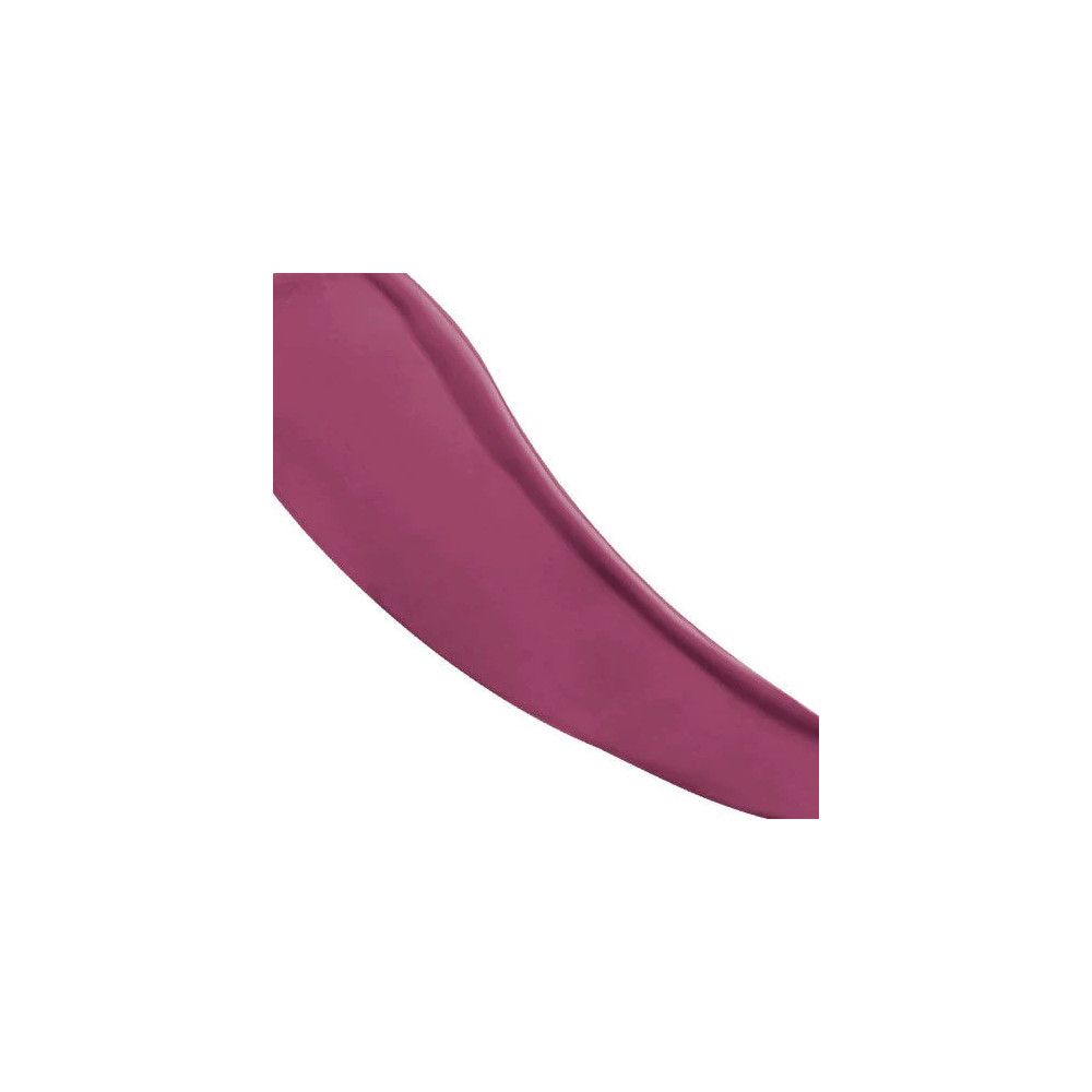 Primo piano di un rossetto rosa. L'applicatore non è visibile.