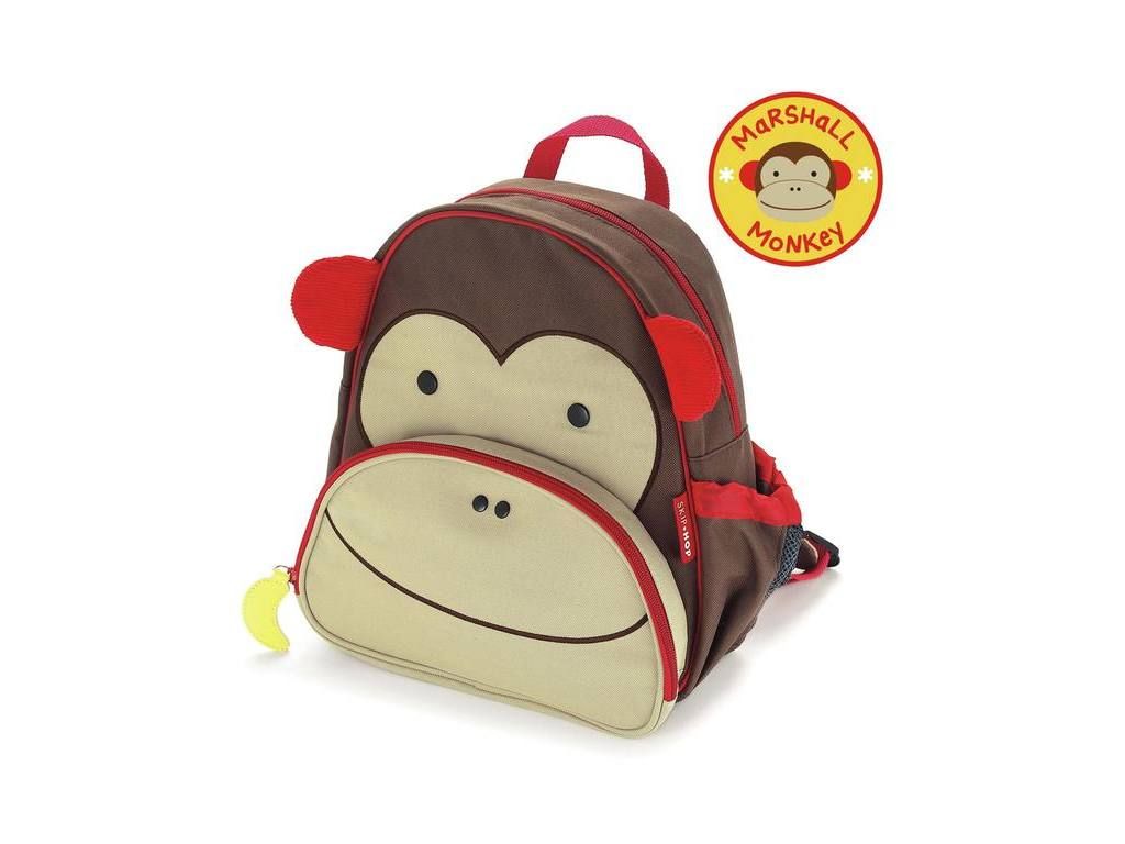 Zaino a forma di scimmia. Marrone, rosso e beige. Con orecchie, occhi e bocca. Cerniera e maniglia. Logo.