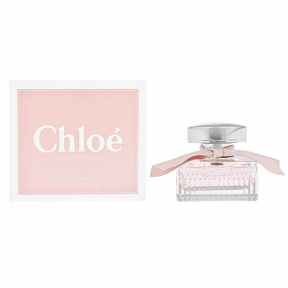 Scatola rosa con scritta bianca Chloé e flacone con liquido rosa, tappo argentato e fiocco rosa.
