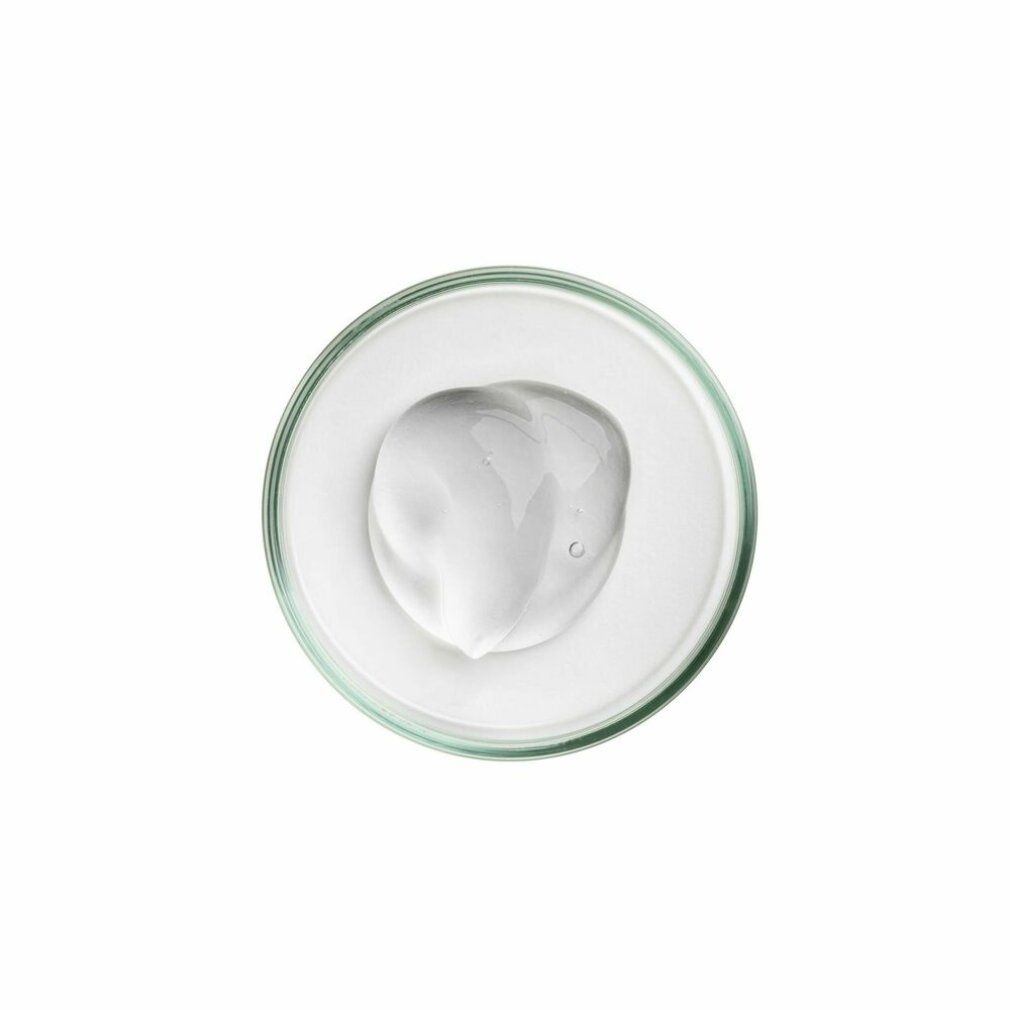 Goccia di gel trasparente in una ciotola di vetro rotonda. Su sfondo bianco.