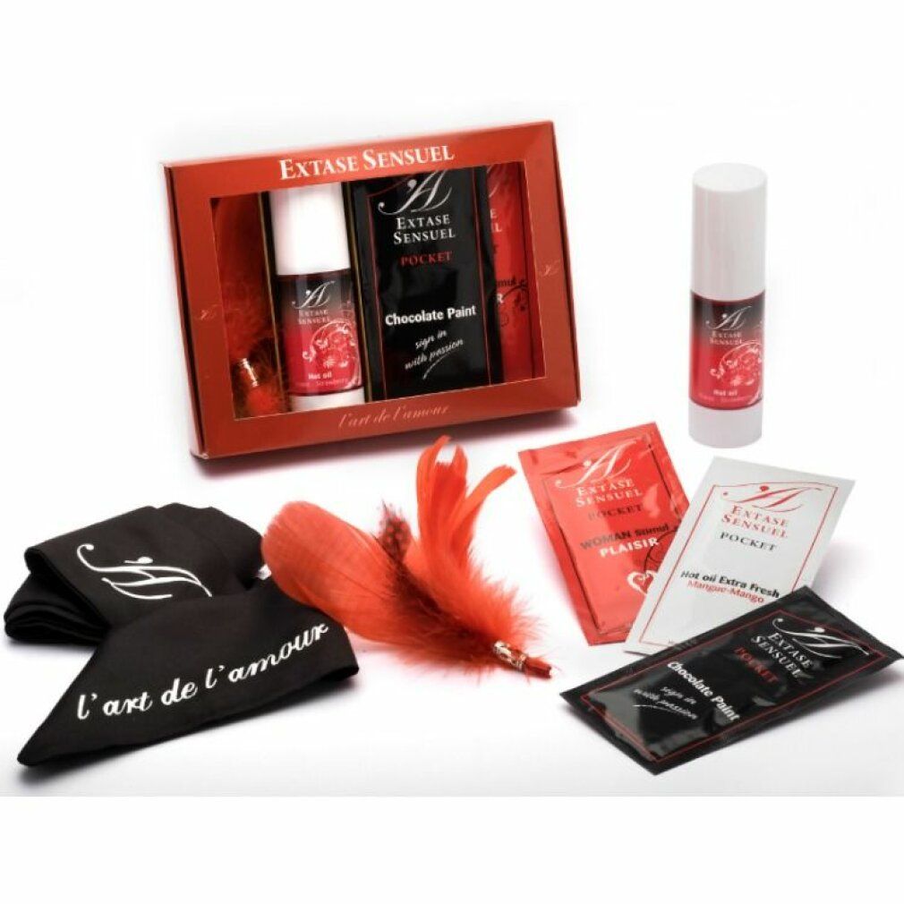 Set regalo con prodotti. Include: bottiglia, bustine, piuma, fazzoletti. Scritte: Extase Sensuel, l'art de l'amour.