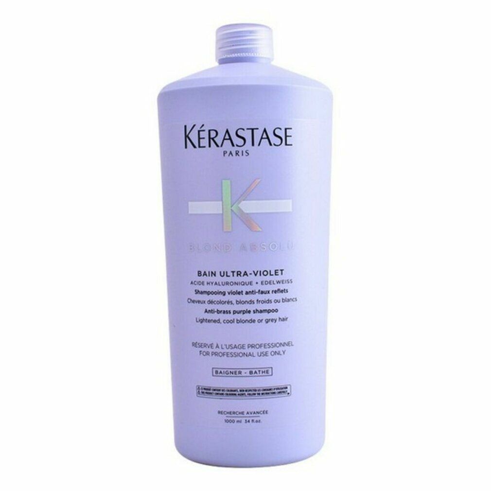 Flacone di shampoo Kérastase Blond Absolu. Flacone viola con etichetta bianca. Testo: Bain Ultra-Violet, per capelli biondi o grigi.