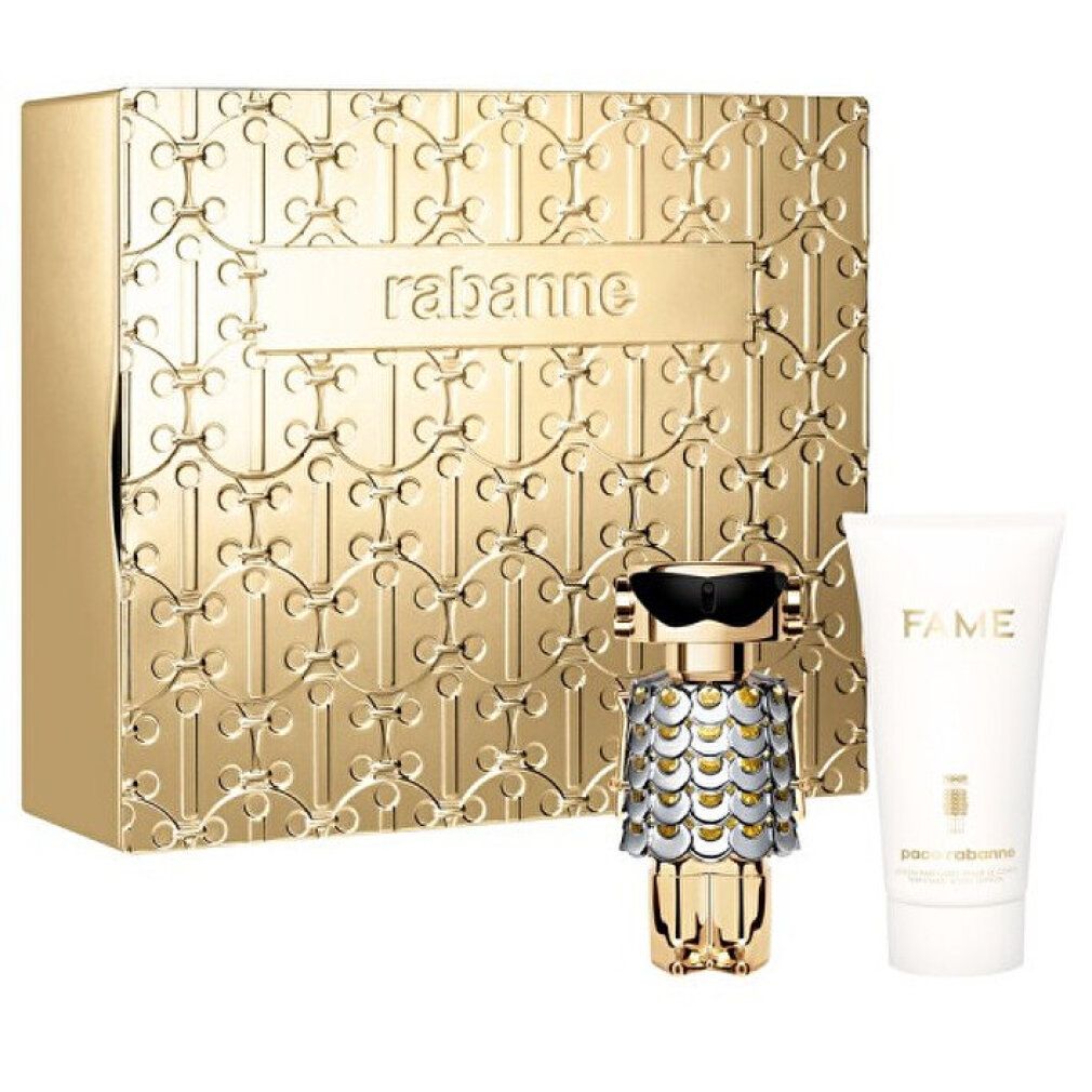 Cofanetto regalo dorato con flacone di profumo e tubo. Scatola goffrata con scritta rabanne. Flacone a forma di robot.