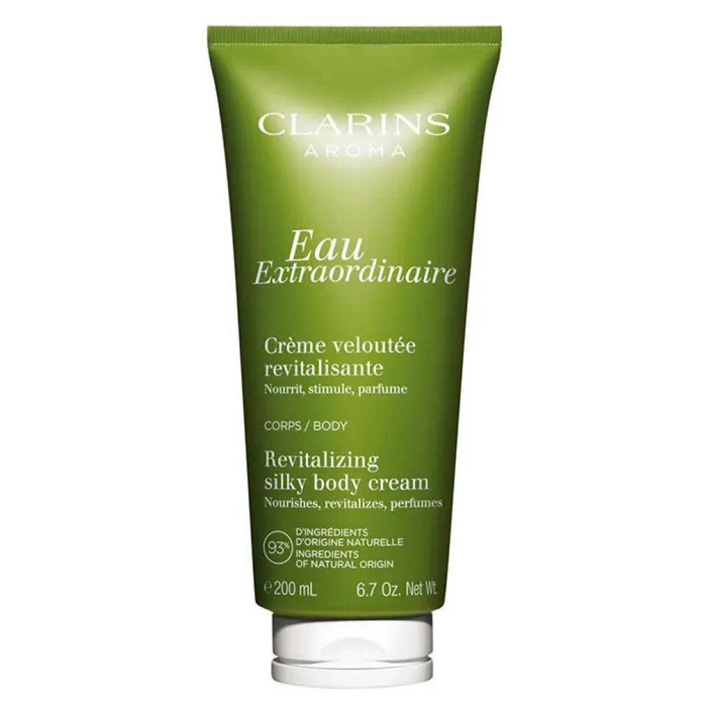 Tubo verde con tappo bianco. Testo: Clarins Aroma, Eau Extraordinaire, Crème veloutée revitalisante, 93% ingredienti di origine naturale.