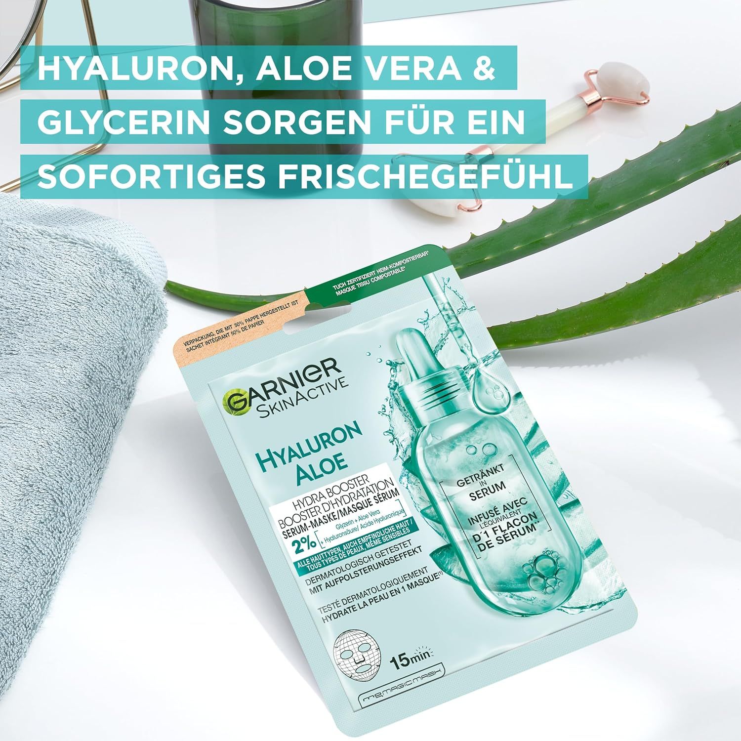 Garnier SkinActive Hyaluron Aloe Hydra Booster Serum-Maske. Confezione con foglia di aloe vera e accessori.