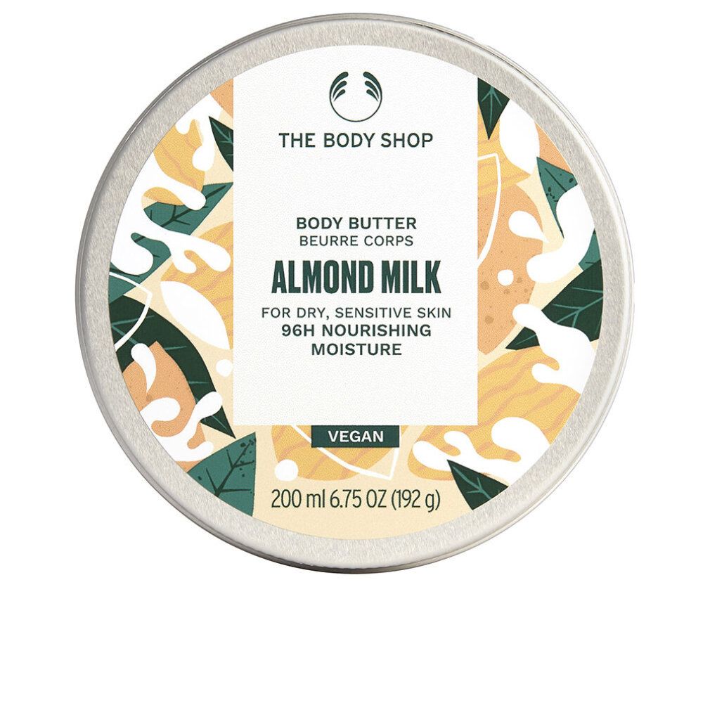 Vasetto rotondo con coperchio argentato. Logo: The Body Shop. Scritta: Body Butter Almond Milk. Vegan. 200 ml.