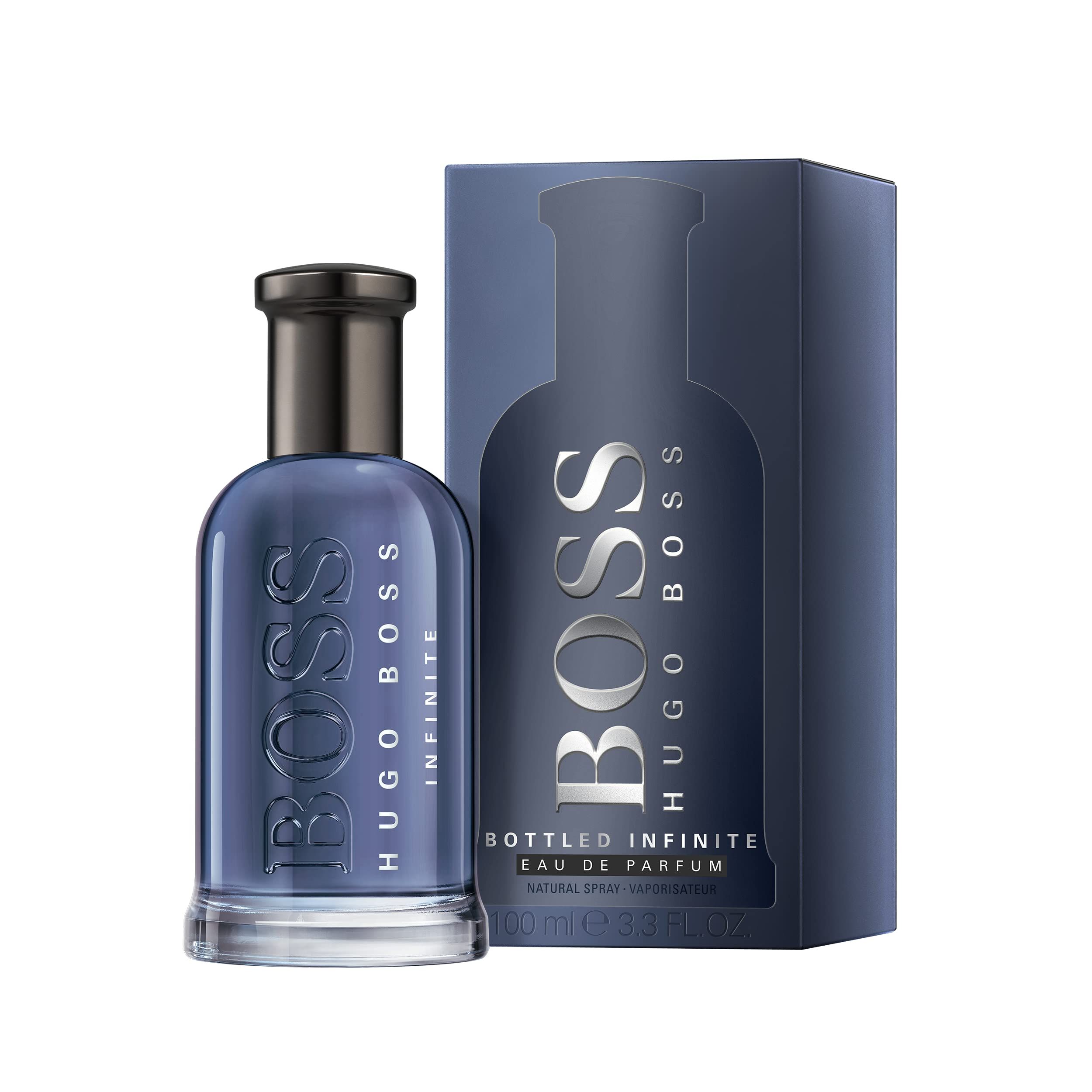Flacone di profumo blu accanto alla confezione blu. Scritta BOSS HUGO BOSS INFINITE. Eau de Parfum.
