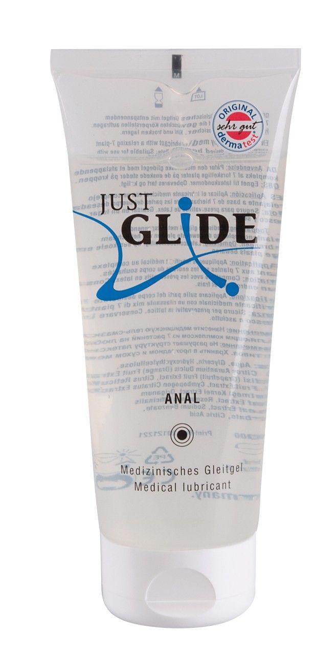 Gel trasparente in tubo. Scritta: JUST GLIDE ANAL. Lubrificante medico. Con sigillo dermatest.