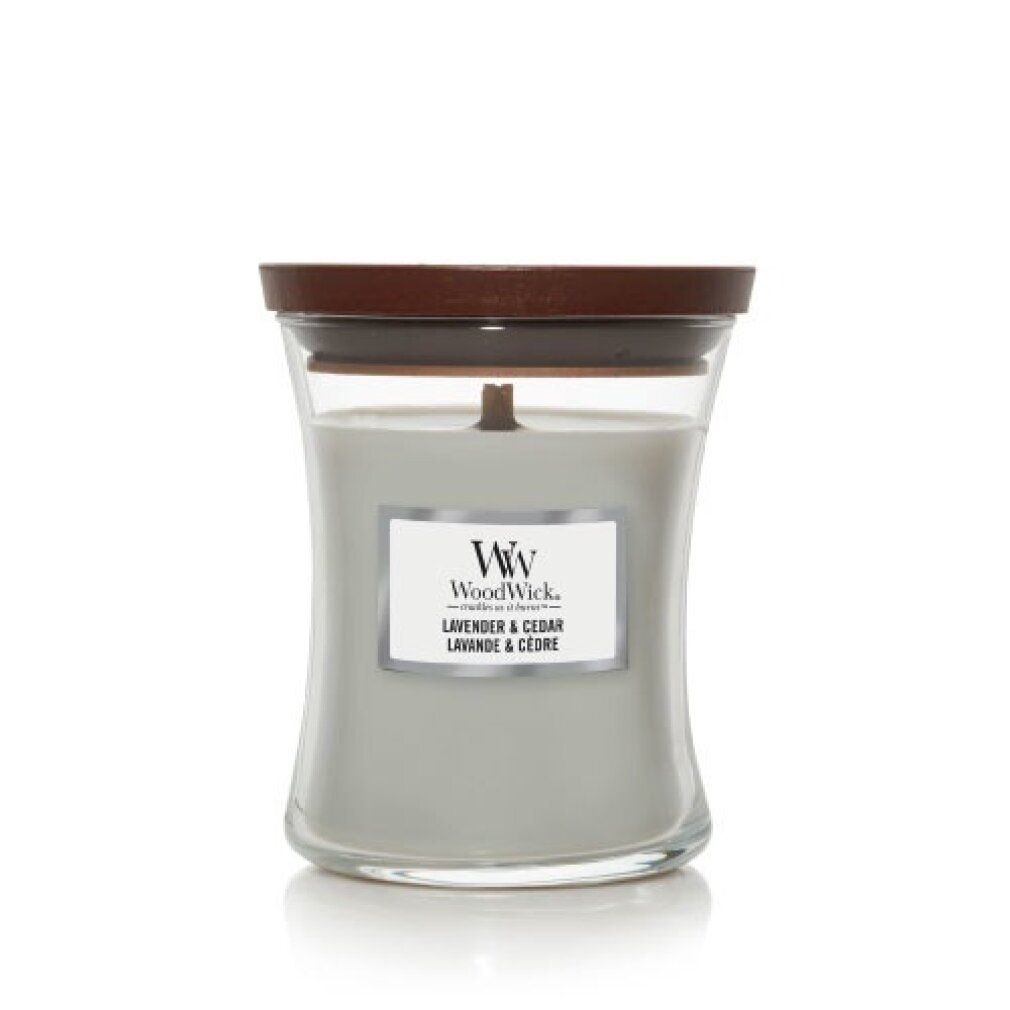 Candela grigia a clessidra con coperchio in legno. Etichetta con logo "Ww" e "Lavender & Cedar".