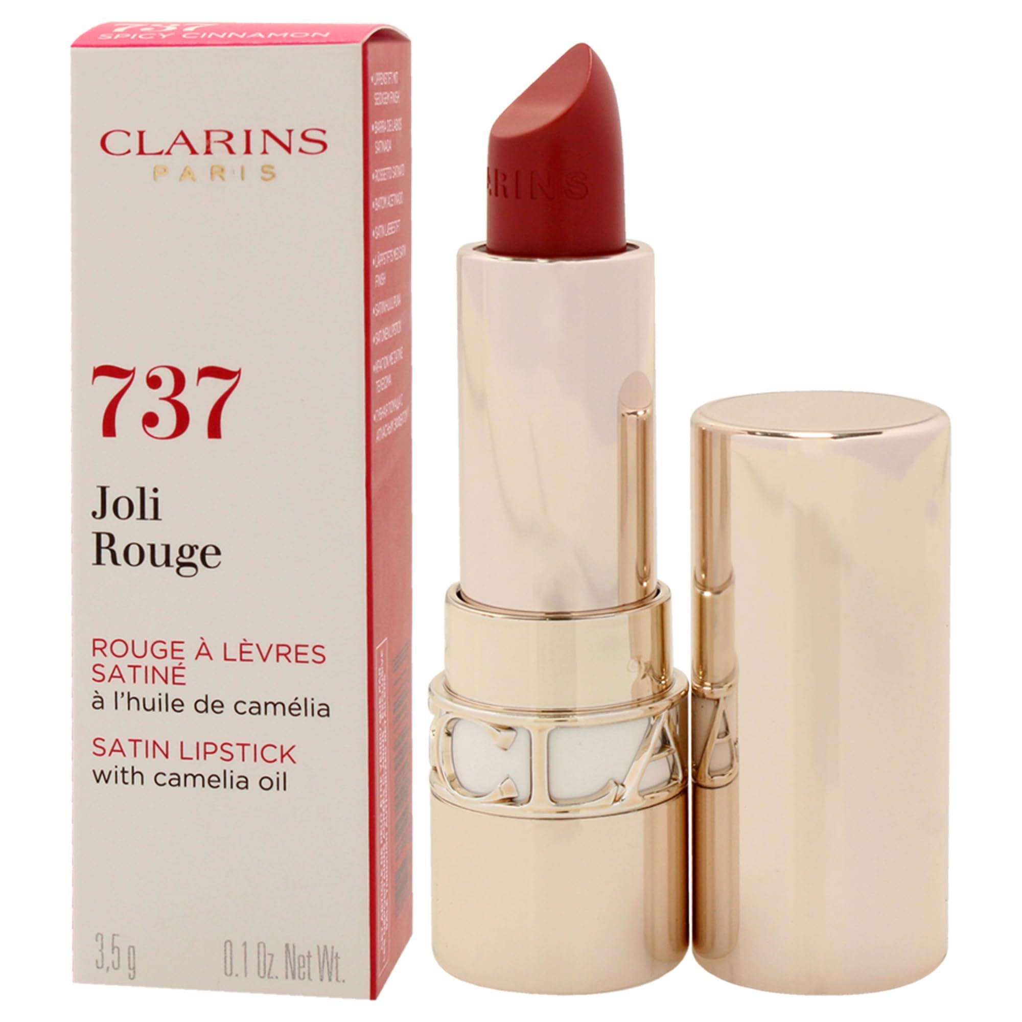 Rossetto Clarins Joli Rouge 737. Rossetto rosso, astuccio dorato, cappuccio aperto. Confezione a sinistra.