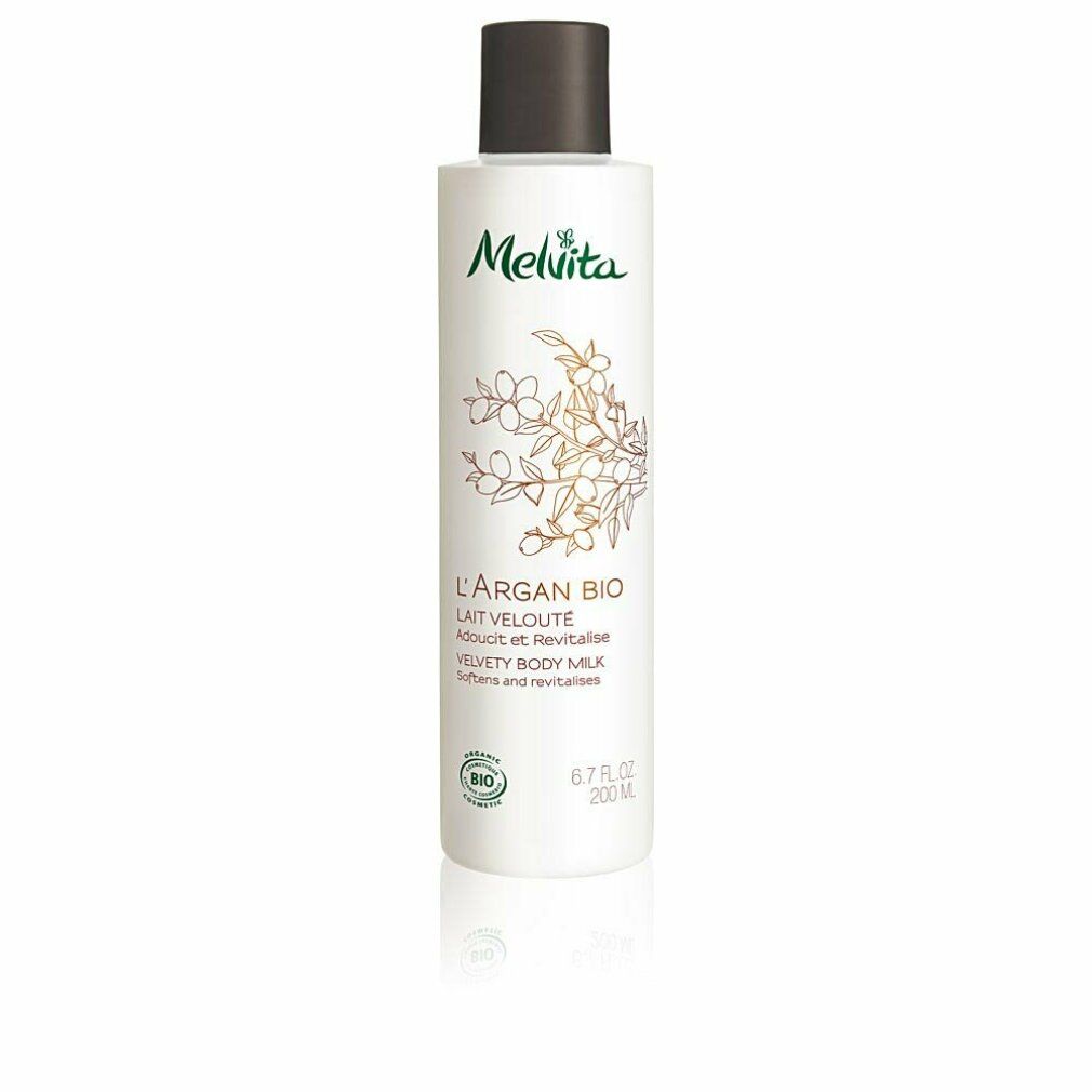 Flacone bianco con tappo marrone. Scritta Melvita, L'Argan Bio, Lait Velouté. Certificazione bio.