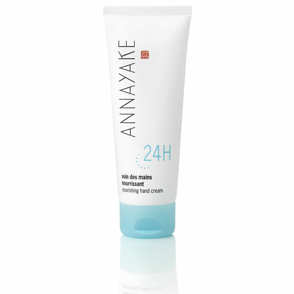Tubo bianco con tappo blu. Scritta: ANNAYAKE, 24H, soin des mains nourrissant, nourishing hand cream.