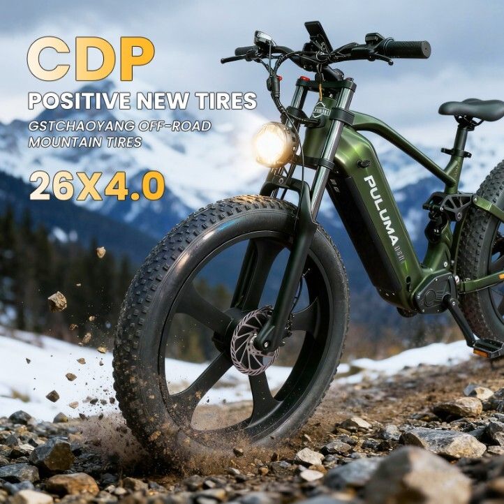 Mountain bike con pneumatici 26x4.0. Testo: CDP, Positive New Tires, GSTCHAOYANG OFF-ROAD MOUNTAIN TIRES.