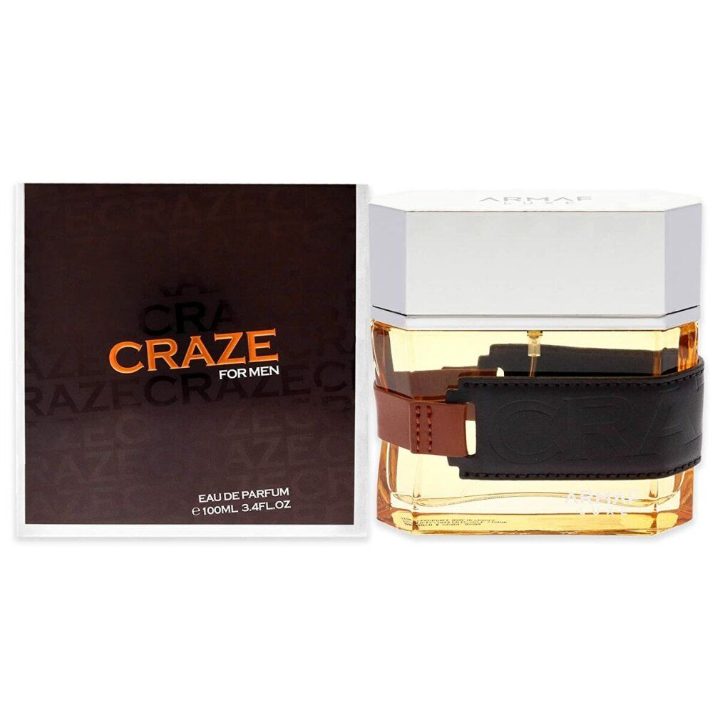 Flacone di profumo con fascia nera e confezione. Scritta "CRAZE FOR MEN".
