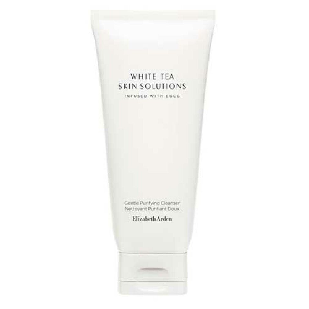 Tubo bianco con testo. Scritta: White Tea Skin Solutions, Infused with EGCG. Sotto: Gentle Purifying Cleanser, Elizabeth Arden.