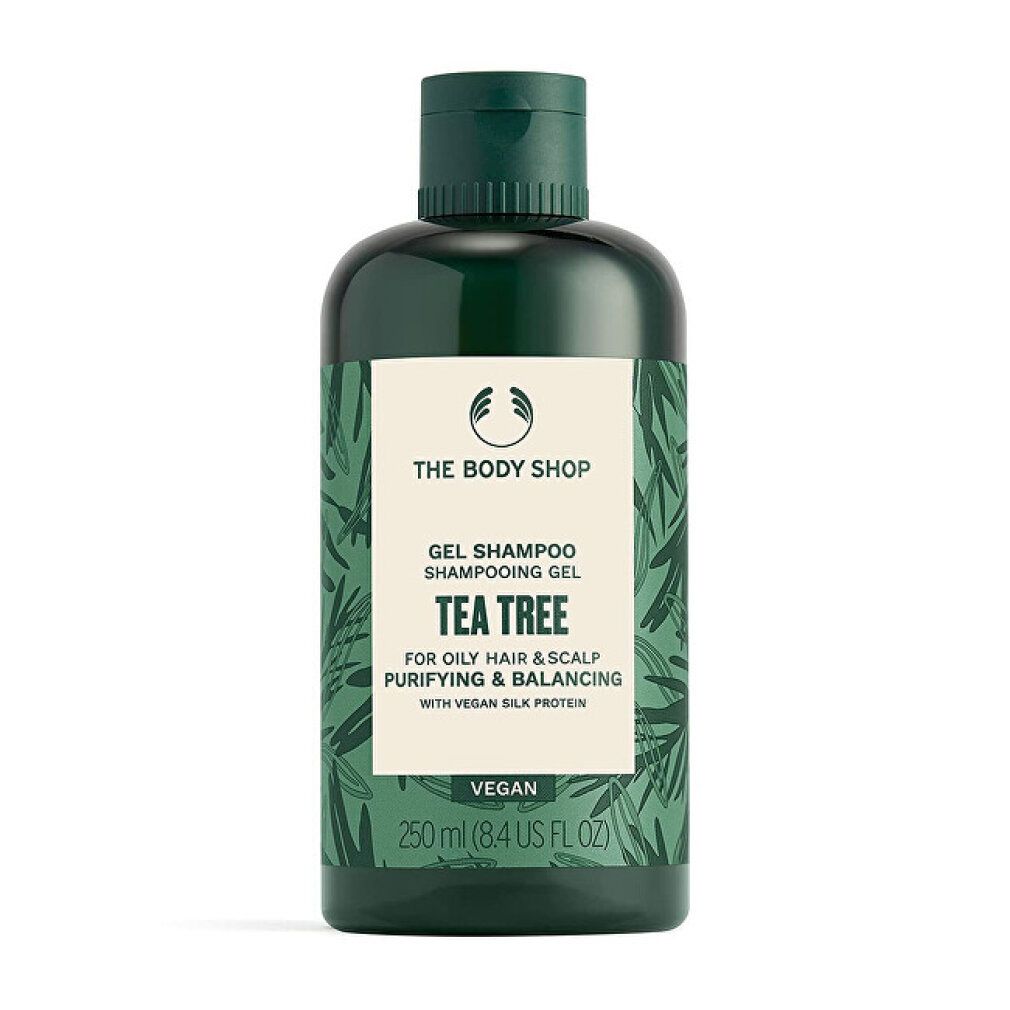 Flacone verde di gel shampoo. Etichetta con nome e ingredienti. Vegano. 250 ml.