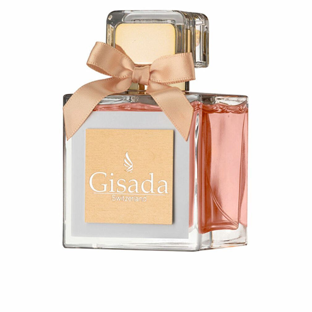 Flacone Gisada Donna Edt Spray, quadrato, con fiocco. Dettagli dorati. Nome del prodotto e marchio visibili.