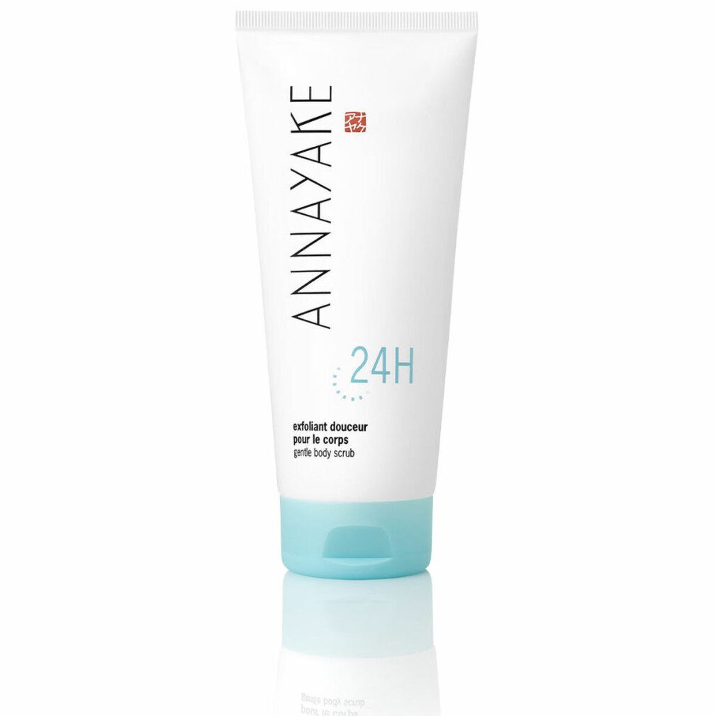 Tubo bianco con tappo blu. Scritta "ANNAYAKE" e "24H". Testo: "Exfoliant douceur pour le corps gentle body scrub".