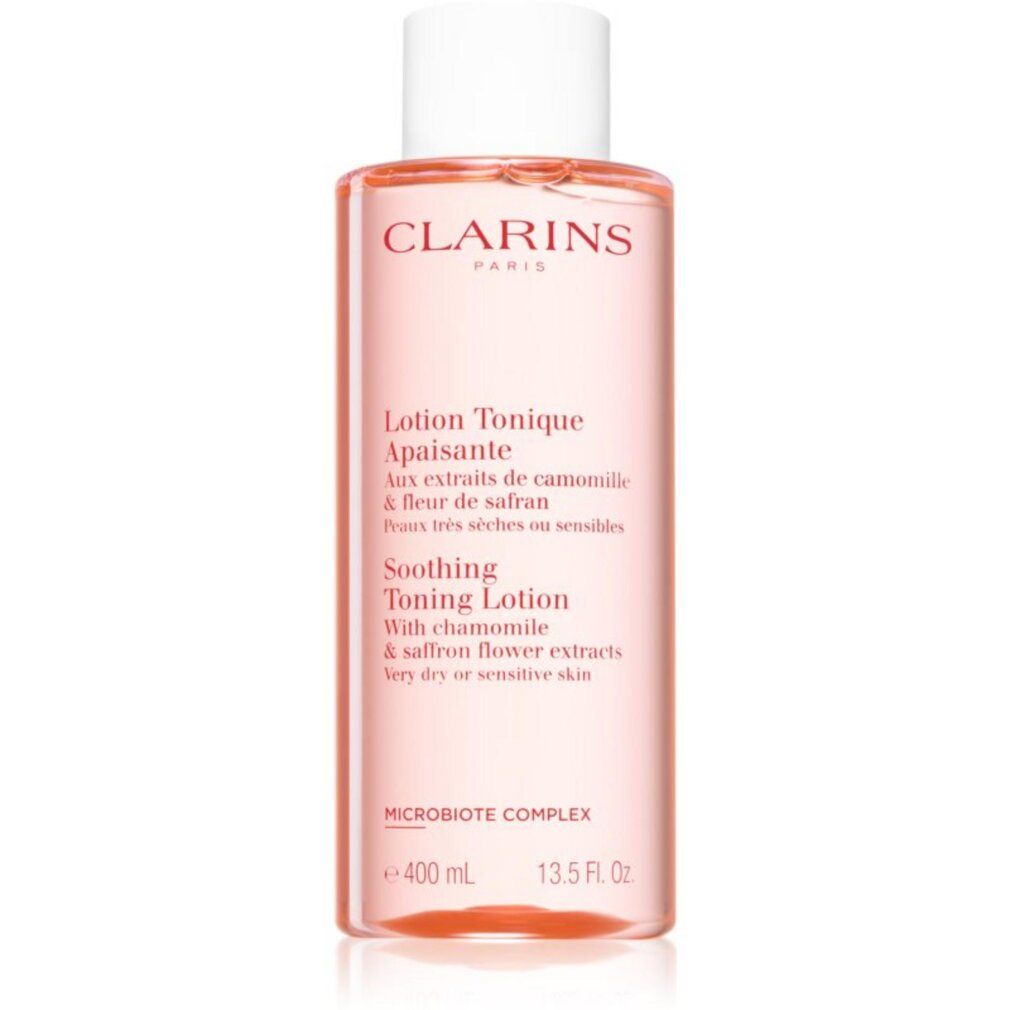 Flacone rosa con tappo bianco. Scritte: CLARINS, Lotion Tonique Apaisante, 400 ml, 13.5 Fl. Oz. Testo in francese e inglese.