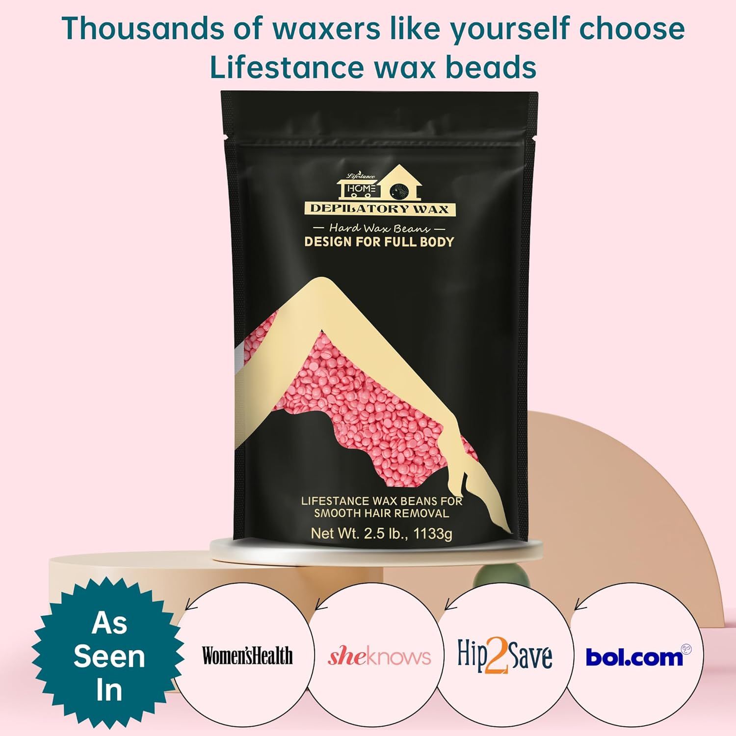 Confezione nera con perle di cera rosa. Testo: Lifestance, cera depilatoria, design per tutto il corpo. Citato in Women's Health, sheknows, Hip2Save, bol.com.