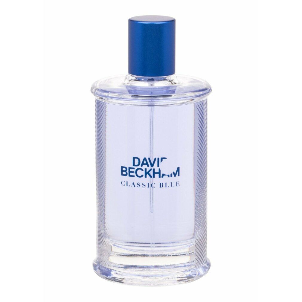 Flacone di vetro blu con vaporizzatore blu. Scritto: DAVID BECKHAM CLASSIC BLUE. Flacone trasparente.