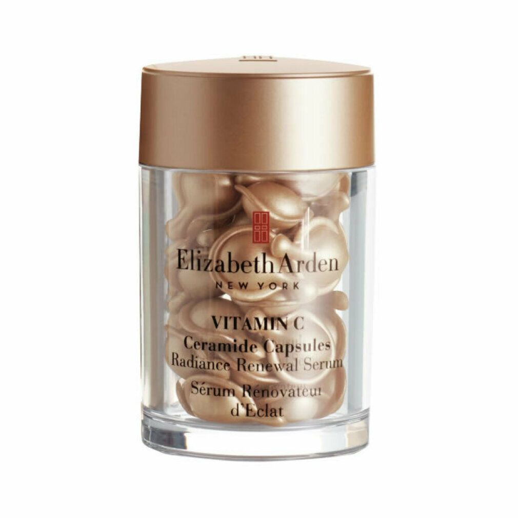 Flacone in vetro con capsule dorate. Scritta: Elizabeth Arden Vitamin C Ceramide Capsules. Siero Rénovateur d'Éclat.