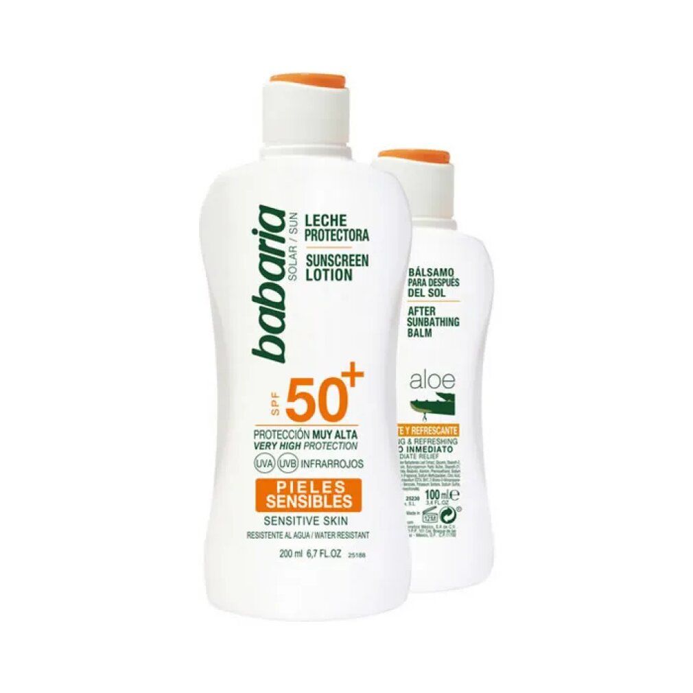 Due flaconi bianchi di lozione solare Babaria SPF50+ e balsamo doposole. Scritta: 'Pieles Sensibles'.