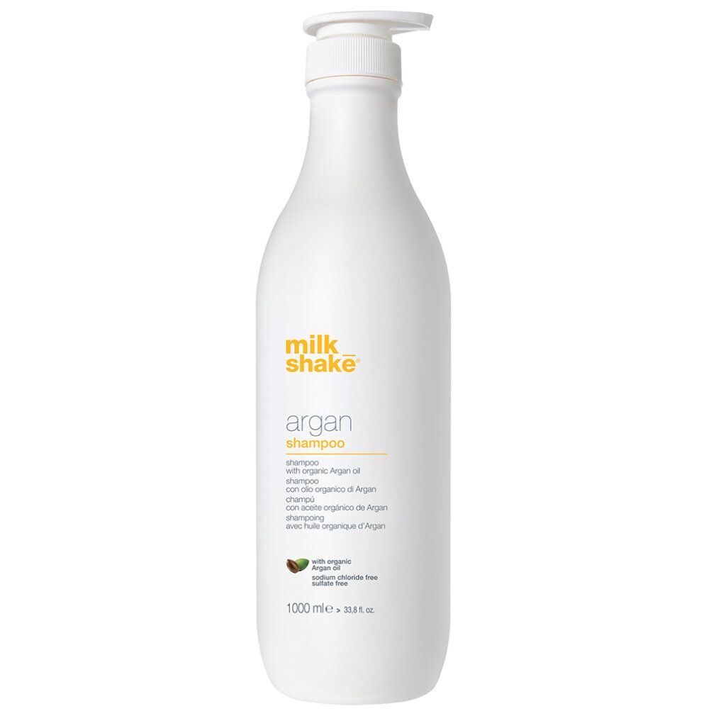 Flacone bianco con etichetta gialla. Scritta: milk_shake argan shampoo. Con olio di argan. 1000 ml.