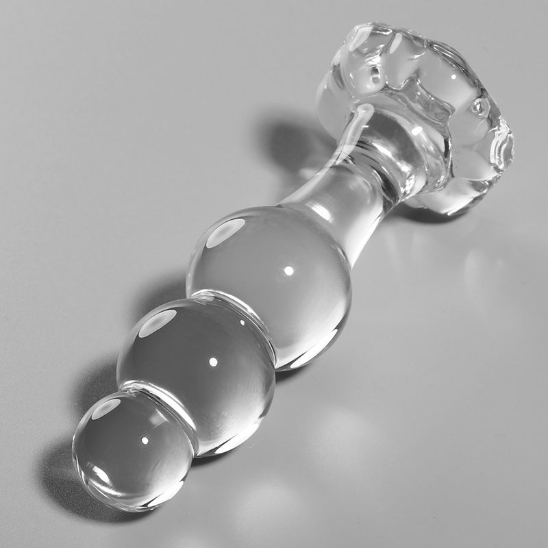 Plug anale in vetro trasparente, tre sfere, base larga. Lunghezza 10,5 cm, larghezza 3 cm.
