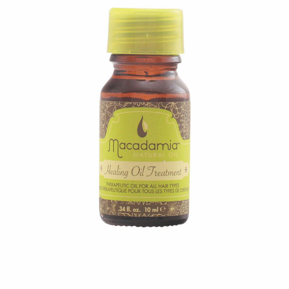 Piccola bottiglia marrone con tappo ed etichetta verdi. Scritta: Macadamia Healing Oil Treatment.