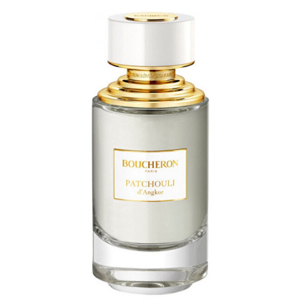 Flacone di profumo. Tappo bianco, dettagli dorati. Scritta: Boucheron Paris, Patchouli d'Angkor.