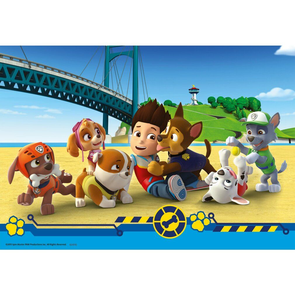 Puzzle Paw Patrol con personaggi. Ragazzo e cani in un interno. Logo e raccomandazione d'età non visibili.