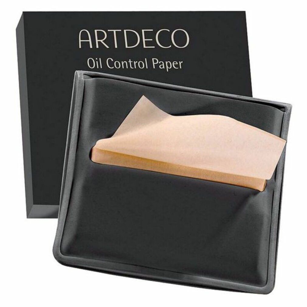 Confezione nera con scritta "ARTDECO Oil Control Paper". Supporto nero con carta assorbente che sporge.