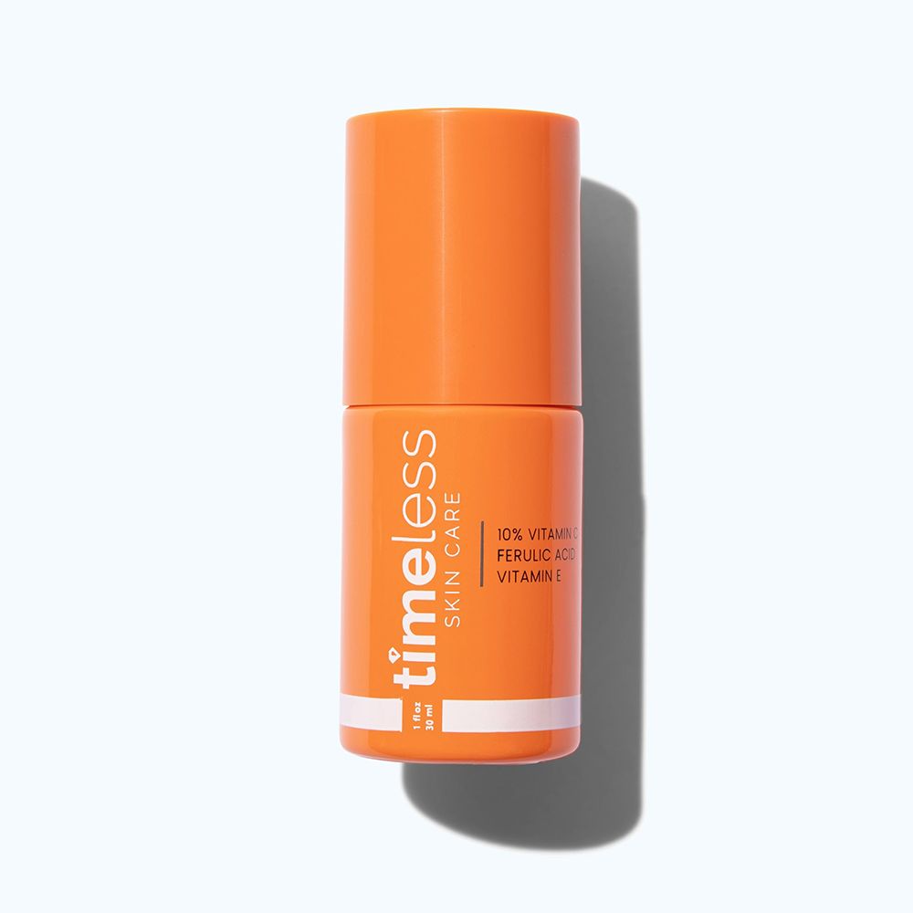 Flacone arancione con etichetta bianca. Scritta: TIMELESS SKIN CARE, 10% Vitamina C, Acido Ferulico, Vitamina E. 1 fl oz / 30 ml.