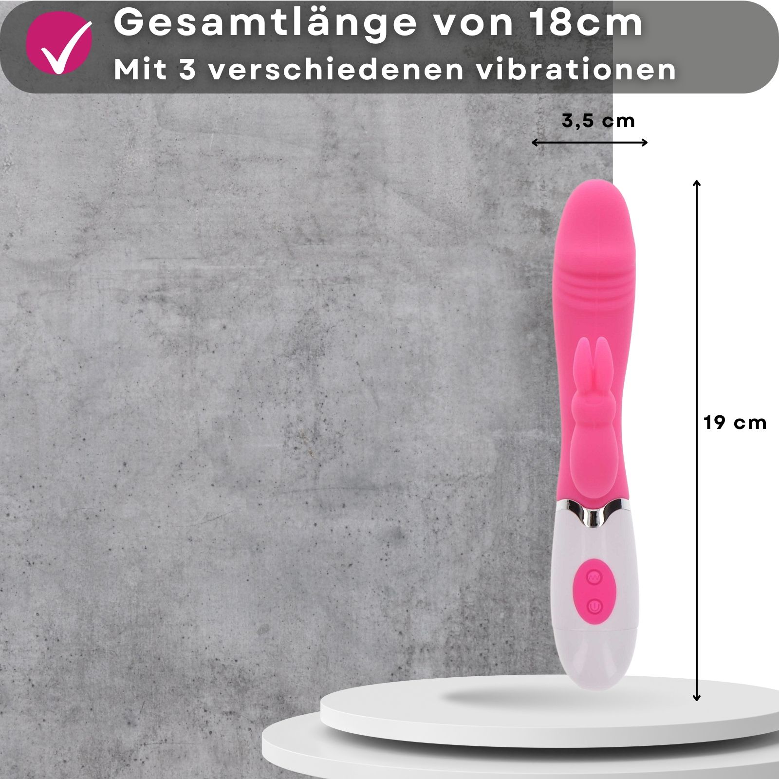 Vibratore rosa con stimolatore a orecchie di coniglio. Testo: 18cm lungo, 3,5cm diametro, 3 vibrazioni. Su piedistallo, indicazioni dimensioni.