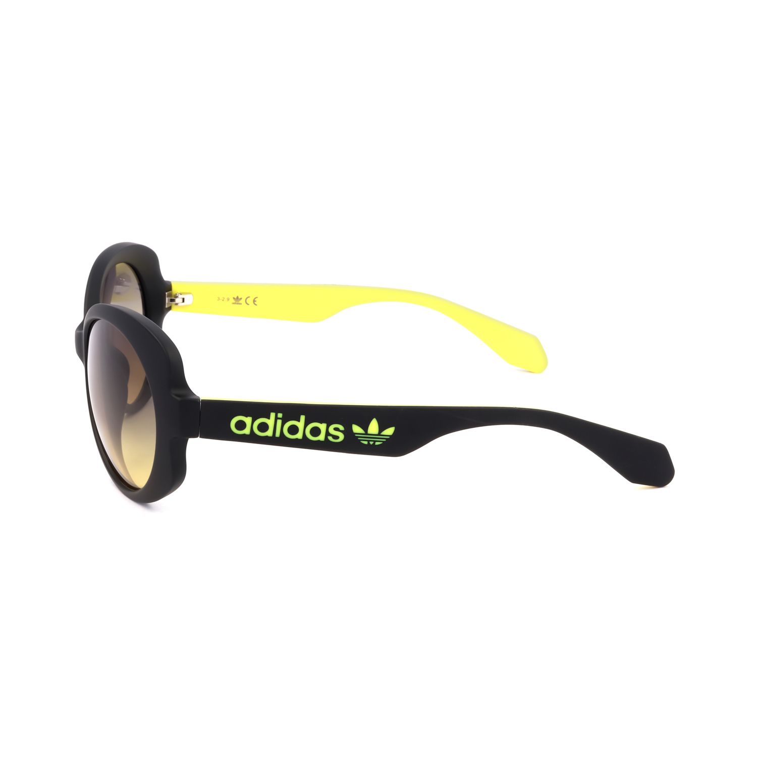 Occhiali da sole Adidas neri con aste gialle e logo verde.