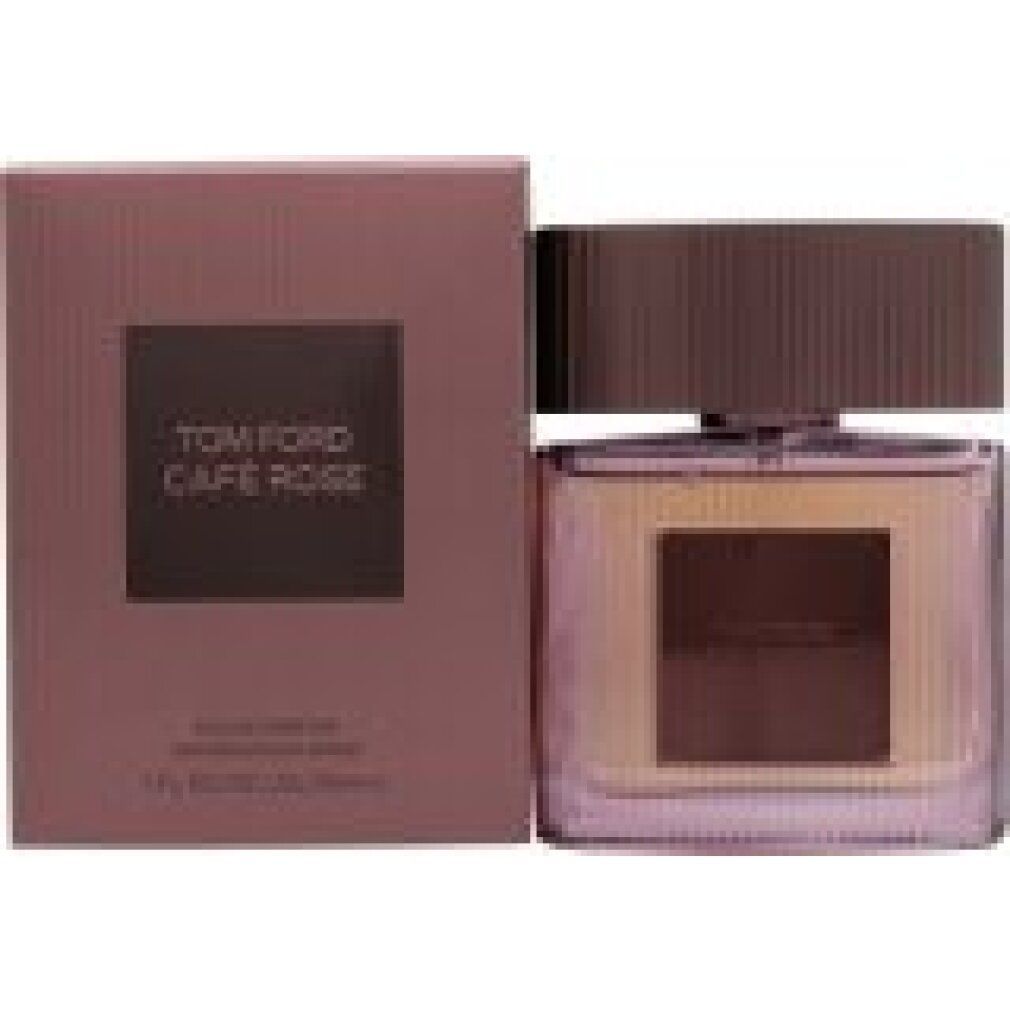 Flacone di profumo rosa con confezione. "TOM FORD Café Rose" è scritto sulla confezione e sul flacone.