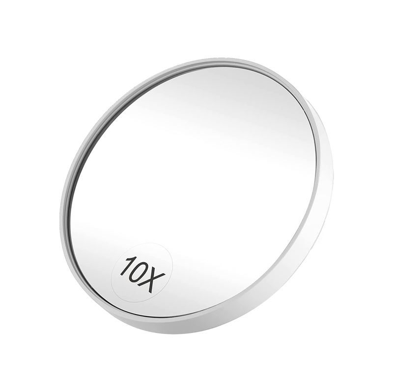 Specchio rotondo d'ingrandimento con ingrandimento 10x e cornice bianca.