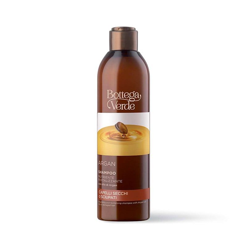 Flacone marrone con fascia bianca. Scritta: Argan Shampoo per capelli secchi. Logo Bottega Verde.