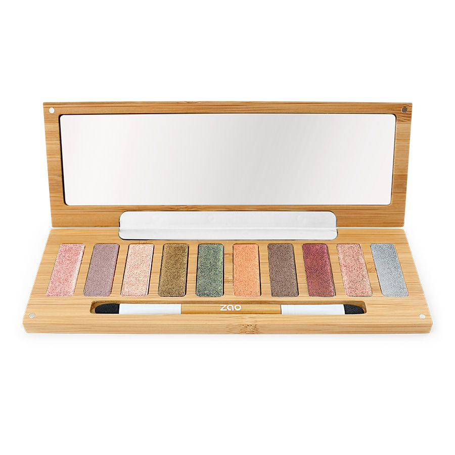 Palette trucco con 10 colori e specchio. Astuccio in legno con pennello. Colori: rosa, viola, oro, verde, arancione, marrone, rosso, argento.